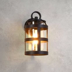 Castle 1-Light Black Hardwired Outdoor Wall Lantern Sconce with Clear Glass by TRUE FINE -Dale Tiffany Store black true fine outdoor sconces td40011ot 4f 1000