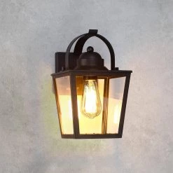 Caroline 1-Light Black Hardwired Outdoor Wall Lantern Sconce with Clear Glass by TRUE FINE -Dale Tiffany Store black true fine outdoor sconces td40012ot 4f 1000