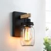 Eliton 1-Light Black/Wood Tone Rustic Farmhouse Wall Sconce with Clear Mason Jar Glass Shades by TRUE FINE 2 Eliton 1-Light Black/Wood Tone Rustic Farmhouse Wall Sconce with Clear Mason Jar Glass Shades by TRUE FINE -Dale Tiffany Store black true fine vanity lighting td10005w 64 1000